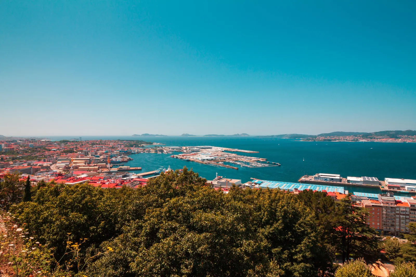 Aerial view of Vigo port and the city on the Ría de Vigo, seen from the hill above with the islands beyond