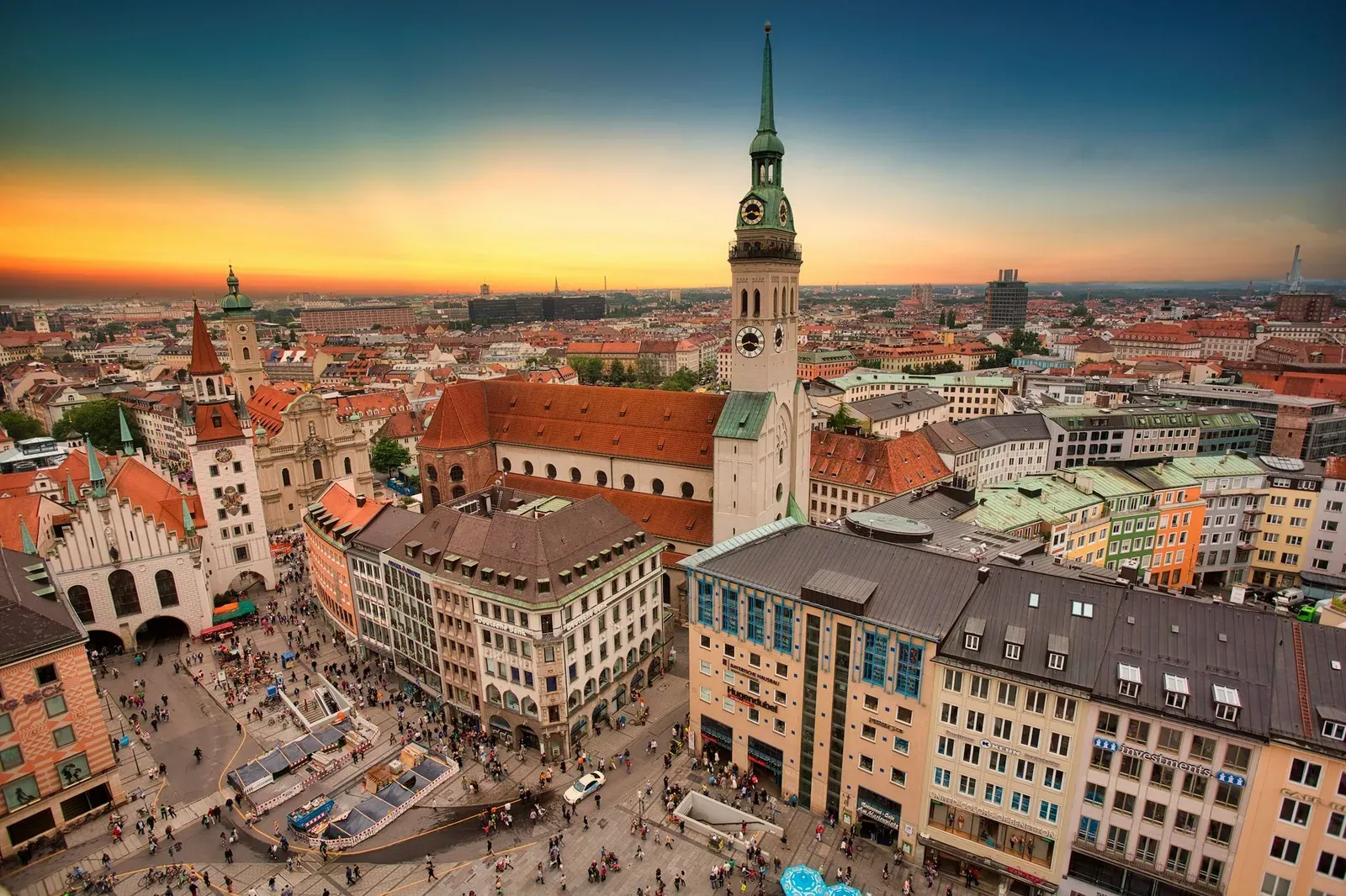 Aerial view of Munich Marienplatz and church towers at sunset