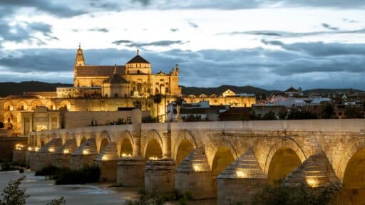 Cordoba Roman Bridge and Mezquita-Catedral at dusk