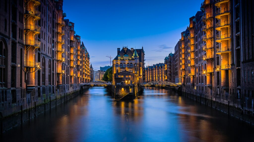 Speicherstadt canal and brick warehouses in Hamburg at night