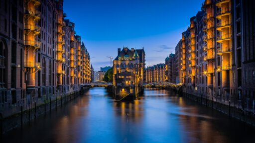 Speicherstadt canal and brick warehouses in Hamburg at night