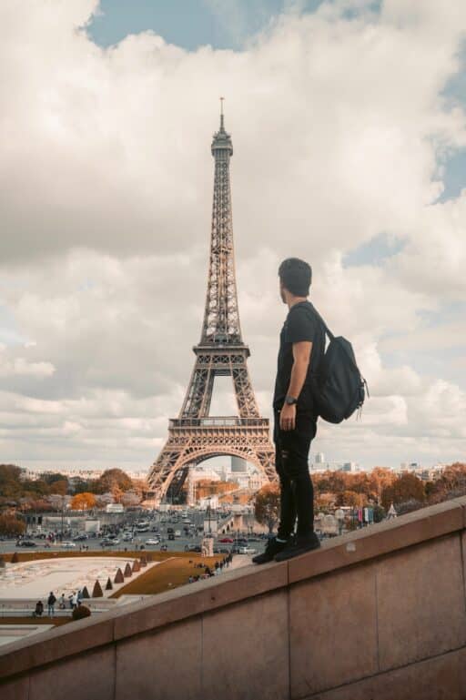 Traveler looking toward the Eiffel Tower in Paris